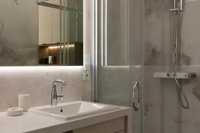 Łazienka w obiekcie Prestige Apartments 4