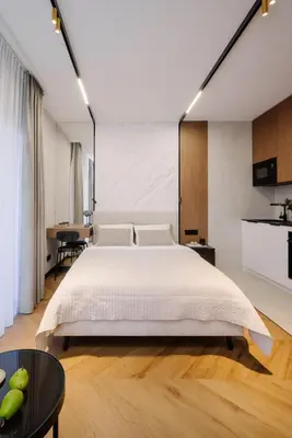 Łóżko lub łóżka w pokoju w obiekcie NeroLux Apartment