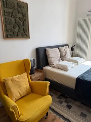 Łóżko lub łóżka w pokoju w obiekcie Mieszkanie Stare miasto Bulwar staromiejski