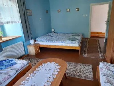 Łóżko lub łóżka w pokoju w obiekcie Lipowy Dwór