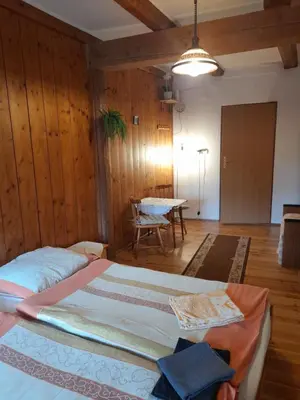 Łóżko lub łóżka w pokoju w obiekcie Lipowy Dwór