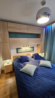 Łóżko lub łóżka w pokoju w obiekcie Marel-Apartament Szafir Polanica Zdrój centrum