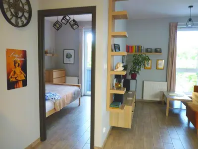 Łóżko lub łóżka w pokoju w obiekcie Apartament Glatz - na Letniej, Kłodzko, winda, garaż podziemny, balkon z widokiem na góry