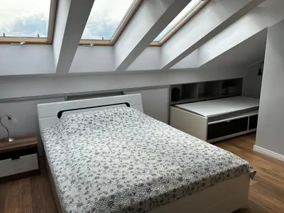 Łóżko lub łóżka w pokoju w obiekcie Apartament Podzamcze Blankowa