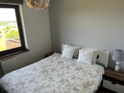 Łóżko lub łóżka w pokoju w obiekcie Apartament Podzamcze Blankowa