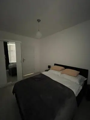 Łóżko lub łóżka w pokoju w obiekcie Apartament 4 Wolności