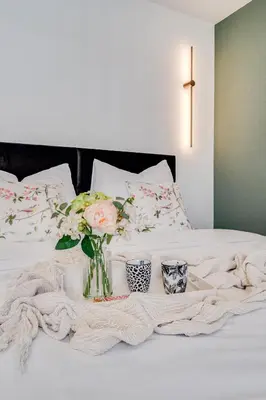 Łóżko lub łóżka w pokoju w obiekcie Muzealna Residence