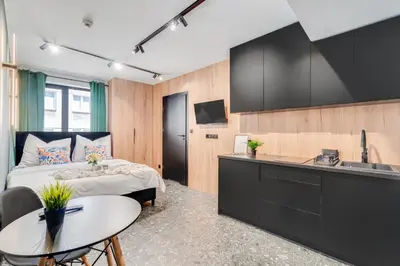 Telewizja i/lub zestaw kina domowego w obiekcie Muzealna City Stay