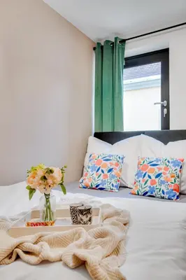Łóżko lub łóżka w pokoju w obiekcie Muzealna Business Rooms