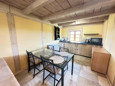 Kuchnia lub aneks kuchenny w obiekcie Domki Machnice