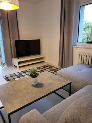 Telewizja i/lub zestaw kina domowego w obiekcie Apartament Piastowska