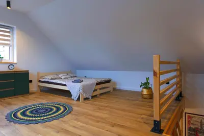 Łóżko lub łóżka w pokoju w obiekcie Apartament Kościuszki