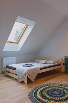 Łóżko lub łóżka w pokoju w obiekcie Apartament Kościuszki