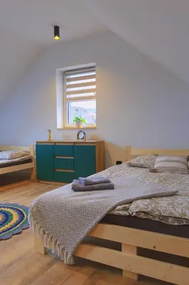 Łóżko lub łóżka w pokoju w obiekcie Apartament Kościuszki