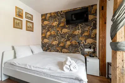 Łóżko lub łóżka w pokoju w obiekcie RentPlanet - Studio Rynek Ratusz