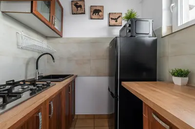 Kuchnia lub aneks kuchenny w obiekcie RentPlanet - Studio Kazimierza Wielkiego