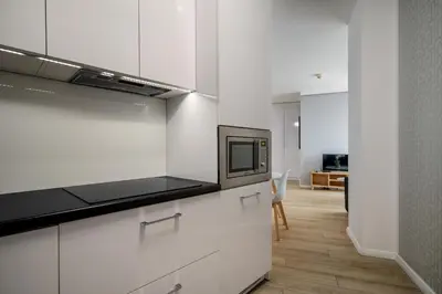 Kuchnia lub aneks kuchenny w obiekcie RentPlanet - Apartamenty Krawiecka