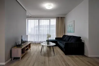 Telewizja i/lub zestaw kina domowego w obiekcie RentPlanet - Apartamenty Krawiecka