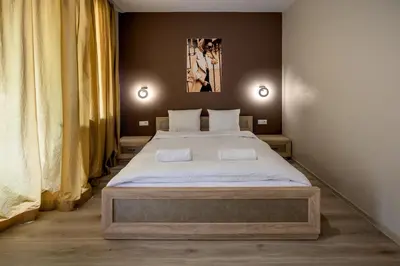 Łóżko lub łóżka w pokoju w obiekcie RentPlanet - Apartamenty Krawiecka