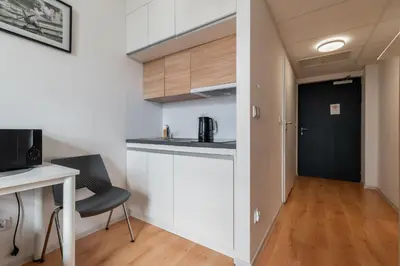 Kuchnia lub aneks kuchenny w obiekcie RentPlanet - Studio Bierutowska