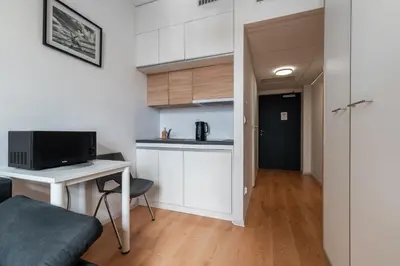 Kuchnia lub aneks kuchenny w obiekcie RentPlanet - Studio Bierutowska