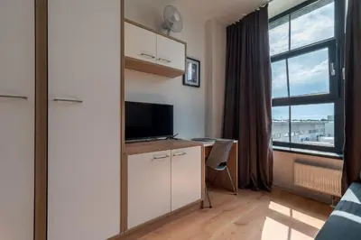 Telewizja i/lub zestaw kina domowego w obiekcie RentPlanet - Studio Bierutowska