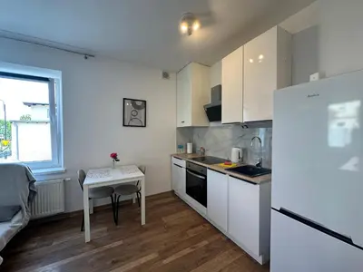 Kuchnia lub aneks kuchenny w obiekcie Sukces Apartament przy deptaku