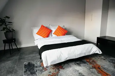 Łóżko lub łóżka w pokoju w obiekcie Lumina Świętego Mikołaja