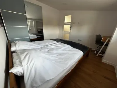 Łóżko lub łóżka w pokoju w obiekcie Loft Apartments Bielawa 