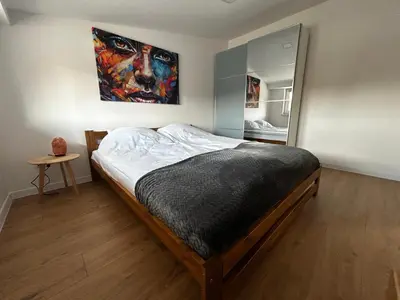 Łóżko lub łóżka w pokoju w obiekcie Loft Apartments Bielawa 