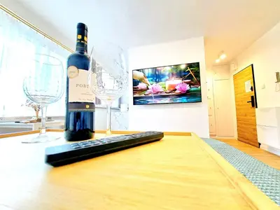 Telewizja i/lub zestaw kina domowego w obiekcie Apartament Dominikanski