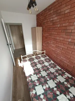 Łóżko lub łóżka w pokoju w obiekcie Apartament Jasne