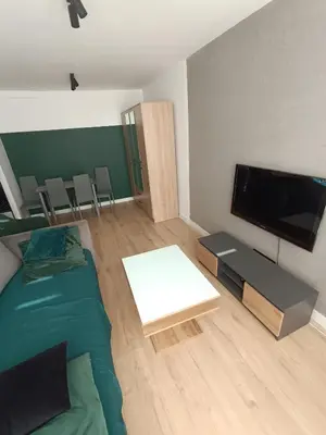 Telewizja i/lub zestaw kina domowego w obiekcie Apartament Jasne