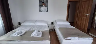 Łóżko lub łóżka w pokoju w obiekcie Dom pod Śnieżnikiem