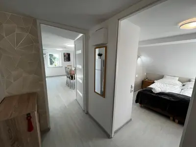 Łóżko lub łóżka w pokoju w obiekcie Apartament Rodzinny