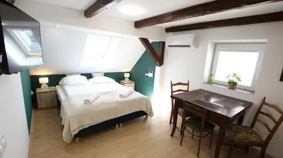 Łóżko lub łóżka w pokoju w obiekcie Apartament Rodzinny