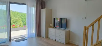 Telewizja i/lub zestaw kina domowego w obiekcie Domek Wilk