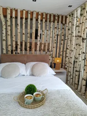 Łóżko lub łóżka w pokoju w obiekcie Stara Kamienica pod Białym Łabędziem