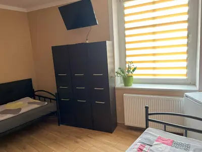 Łóżko lub łóżka w pokoju w obiekcie Pokoje AE BERG