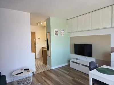 Telewizja i/lub zestaw kina domowego w obiekcie Studio Centrum Tęczowa
