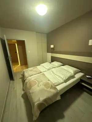Łóżko lub łóżka w pokoju w obiekcie Apartament Czarna Góra Tignes 1