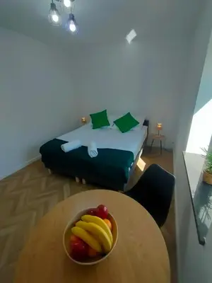 Łóżko lub łóżka w pokoju w obiekcie Apartamenty Monte Cassino
