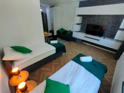 Łóżko lub łóżka w pokoju w obiekcie Apartamenty Monte Cassino