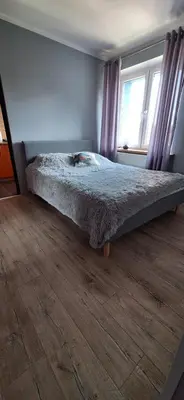 Łóżko lub łóżka w pokoju w obiekcie Między Szczytami
