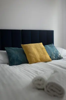 Łóżko lub łóżka w pokoju w obiekcie Apartament Blue