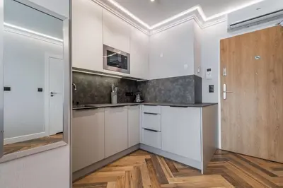 Kuchnia lub aneks kuchenny w obiekcie RentPlanet - Halo Apartament