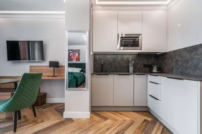 Kuchnia lub aneks kuchenny w obiekcie RentPlanet - Halo Apartament