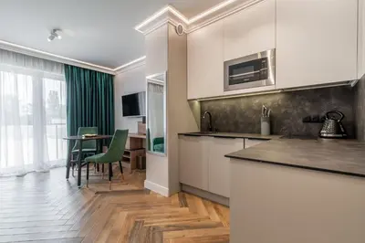 Kuchnia lub aneks kuchenny w obiekcie RentPlanet - Halo Apartament