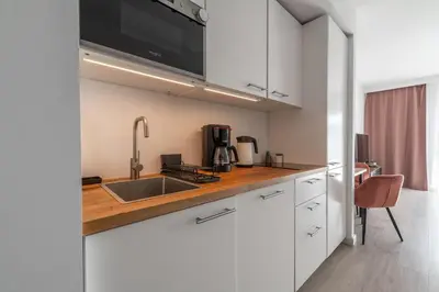 Kuchnia lub aneks kuchenny w obiekcie RentPlanet - Apartament Ptasia