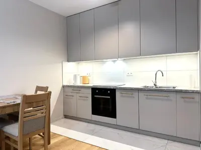 Kuchnia lub aneks kuchenny w obiekcie Wichrowa Apartment - Parking - Self Check-In 20h
